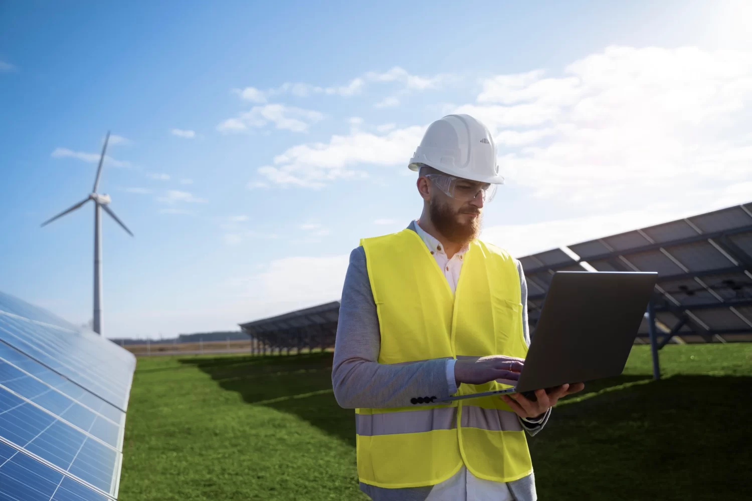 medium-shot-engineer-holding-laptop